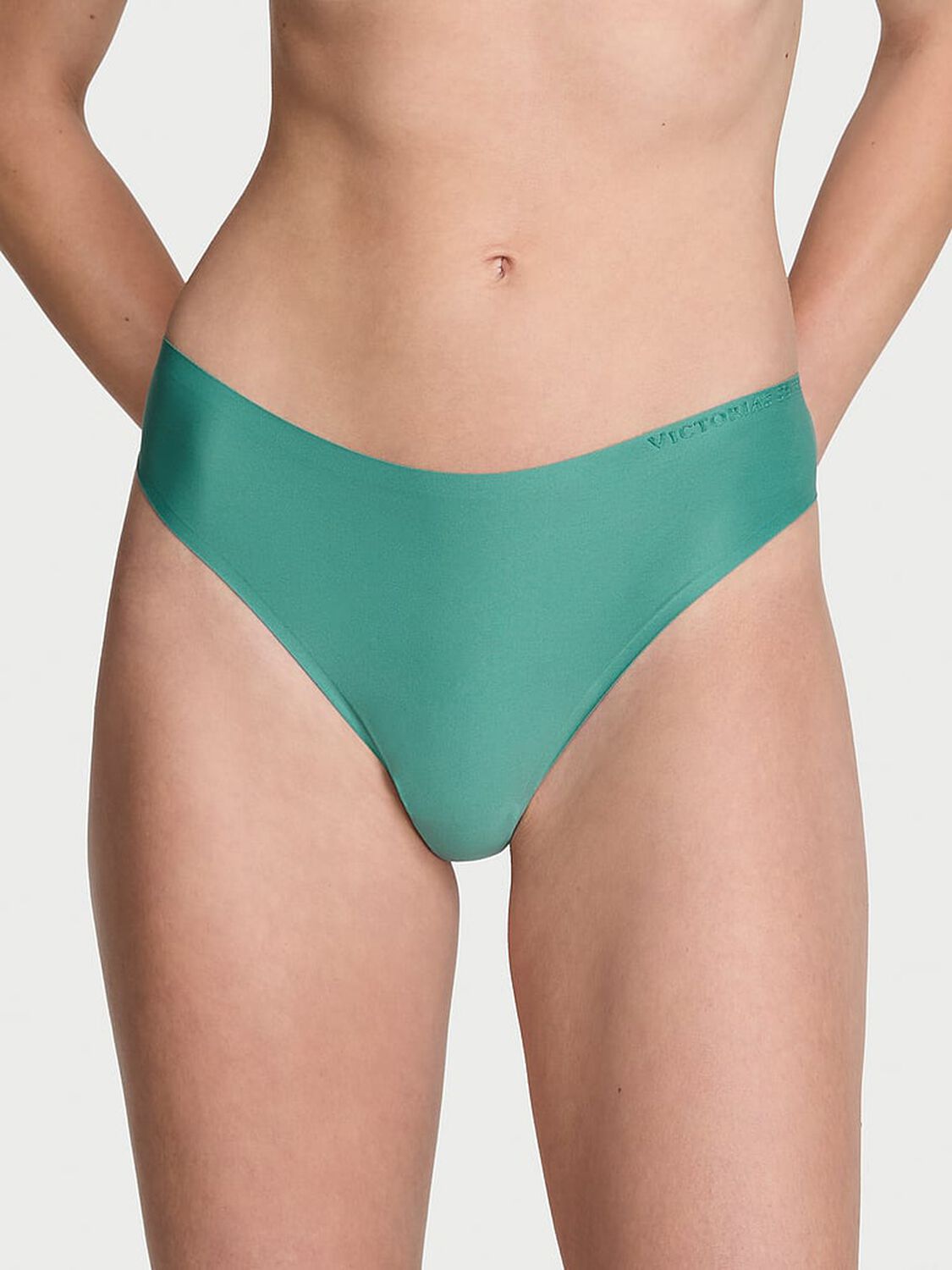 vs Body By Victoria Body by Victoria Flex Mid-Rise Thong Panty Gentle Green 1 of 4 