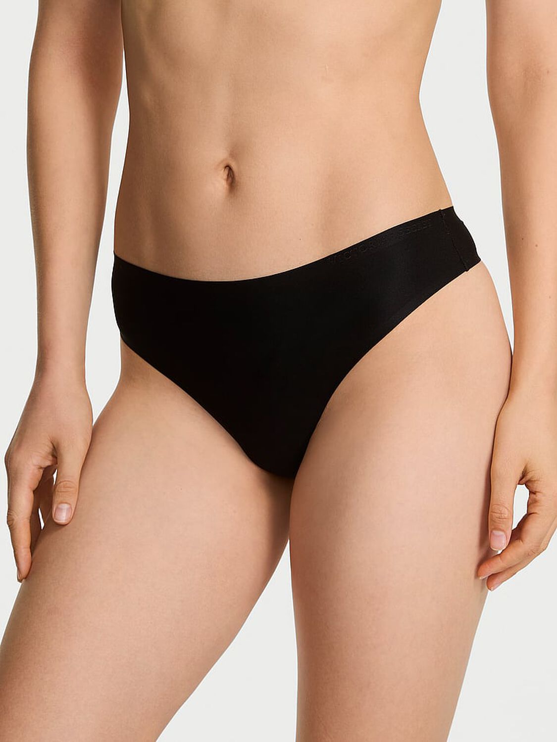 vs Body By Victoria Body by Victoria Flex Mid-Rise Thong Panty Black 1 of 4 