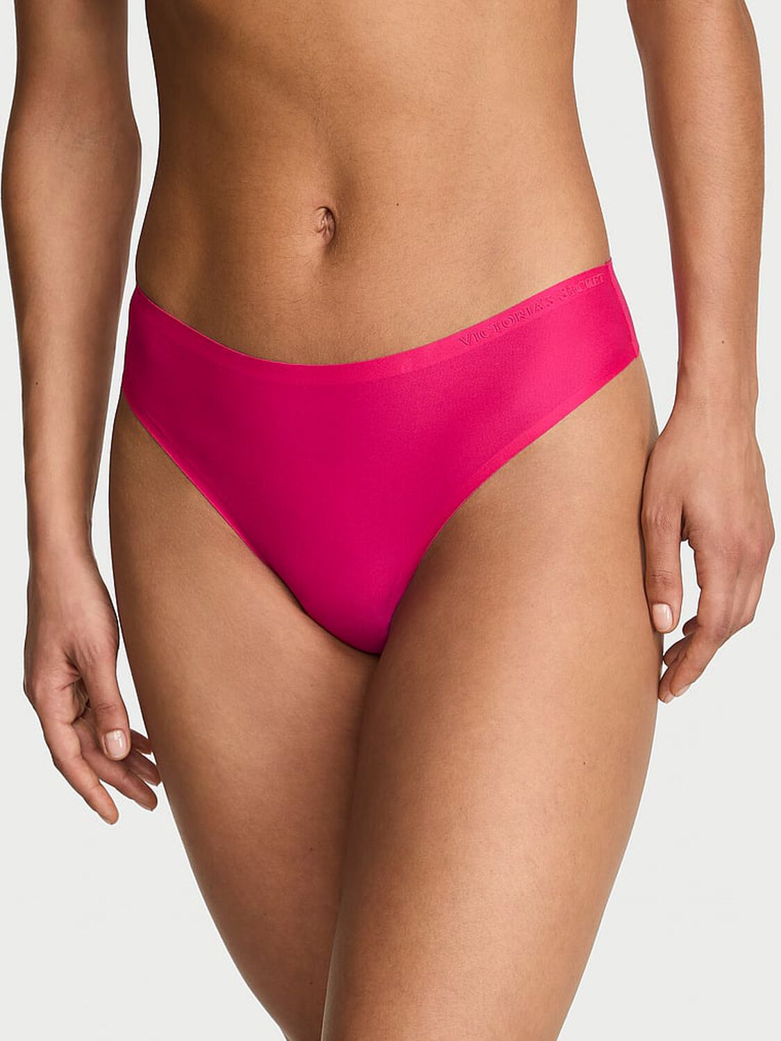 vs Body By Victoria Body by Victoria Flex Mid-Rise Thong Panty Pop Pink 1 of 2 