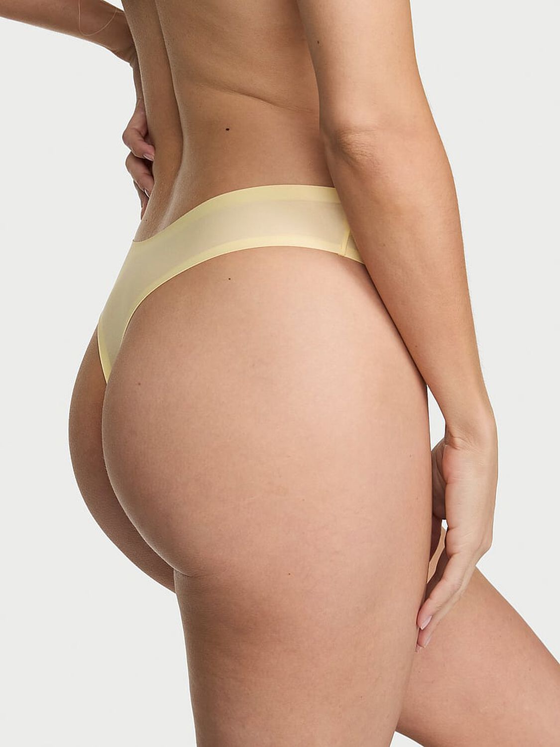 vs Body By Victoria Body by Victoria Flex Mid-Rise Thong Panty Sunny Honey 2 of 3 