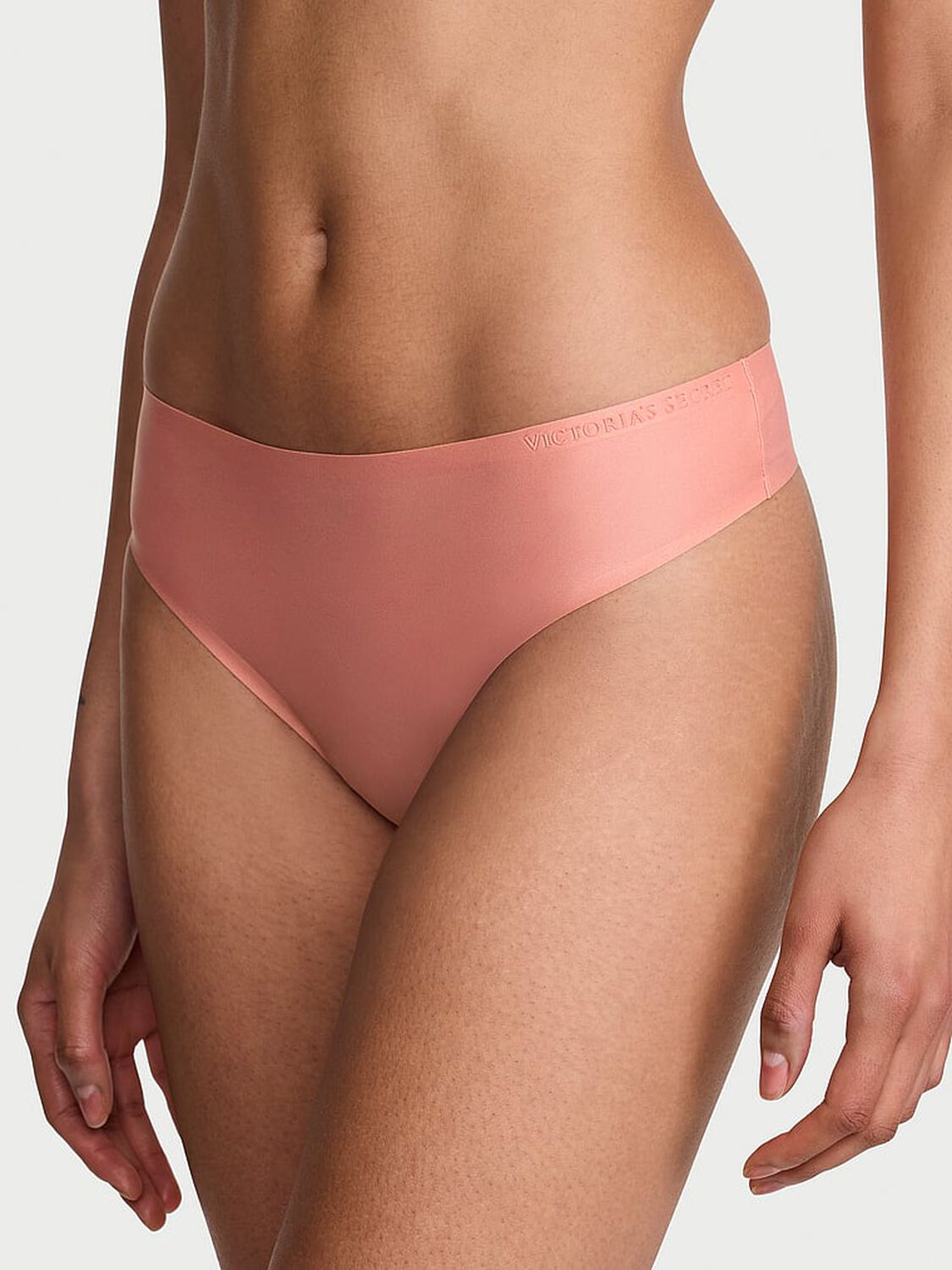vs Body By Victoria Body by Victoria Flex Mid-Rise Thong Panty Blush Pink 1 of 3 